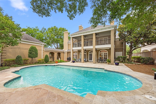 5567 Longmont Dr, Houston, TX 77056 - view of pool with a ceiling fan, a patio area, and french doors