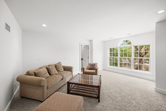 5567 Longmont Dr, Houston, TX 77056 - carpeted living room featuring baseboards and recessed lighting