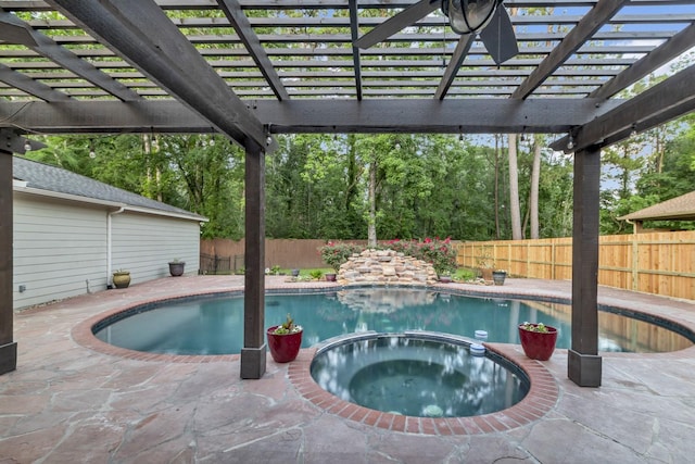 4531 Mulberry Park Ln, Houston, TX 77345 - view of swimming pool with a fenced backyard, a pergola, and a pool with connected hot tub