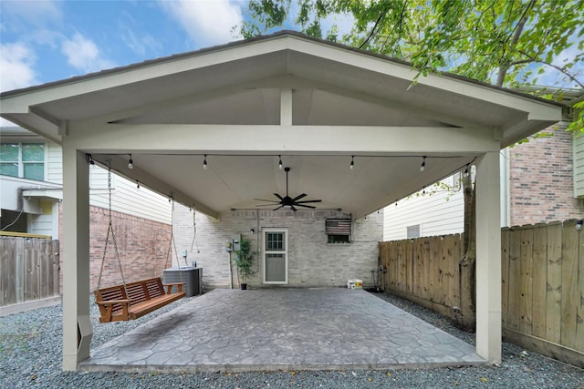 10239 W Palm Lake Dr, Houston, TX 77034 - view of patio with a ceiling fan, fence, central AC, a gazebo, and a carport