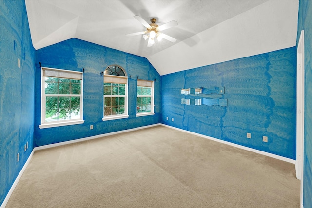 10239 W Palm Lake Dr, Houston, TX 77034 - carpeted spare room featuring vaulted ceiling, ceiling fan, and baseboards