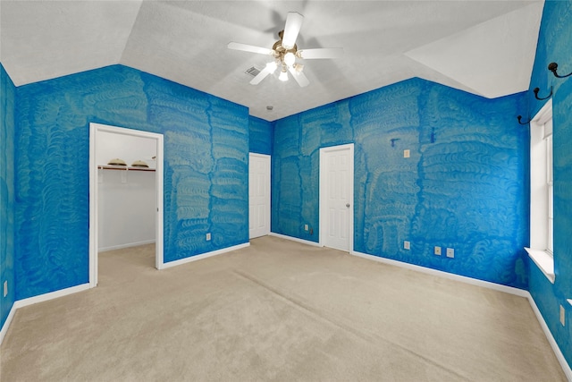 10239 W Palm Lake Dr, Houston, TX 77034 - unfurnished bedroom with baseboards, lofted ceiling, carpet flooring, and a ceiling fan