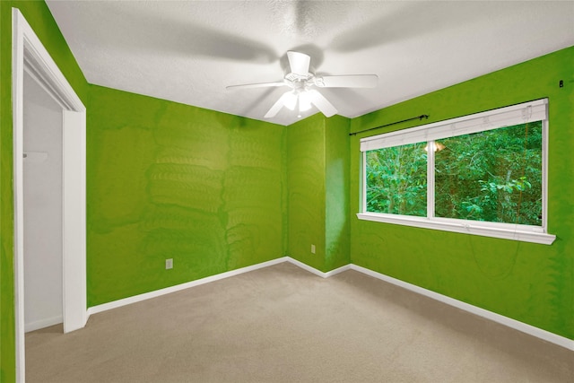 10239 W Palm Lake Dr, Houston, TX 77034 - empty room with ceiling fan, carpet flooring, and baseboards