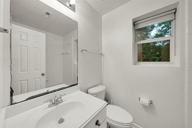 10239 W Palm Lake Dr, Houston, TX 77034 - bathroom featuring toilet, a shower, vanity, and baseboards