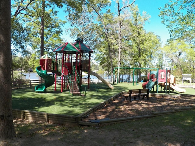 1967 Greentree Dr, Huntsville, TX 77340 - community jungle gym featuring a yard