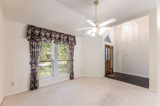 1967 Greentree Dr, Huntsville, TX 77340 - empty room with carpet, lofted ceiling, baseboards, and ceiling fan