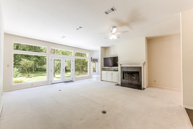 1967 Greentree Dr, Huntsville, TX 77340 - unfurnished living room featuring a fireplace, carpet floors, ceiling fan, and baseboards