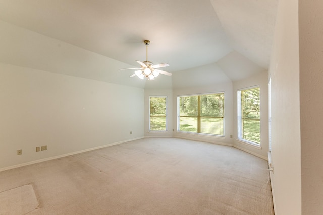 1967 Greentree Dr, Huntsville, TX 77340 - unfurnished room featuring light colored carpet, baseboards, lofted ceiling, and ceiling fan