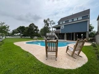 1205 Hall Ave, Seabrook, TX 77586 - swimming pool with a lawn, a patio, and a deck