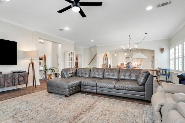 1205 Hall Ave, Seabrook, TX 77586 - living area with wood finished floors, a chandelier, a ceiling fan, ornamental molding, and recessed lighting