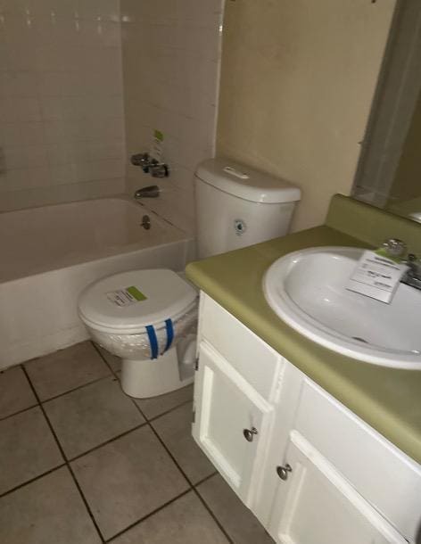 4735 El Vedado St, San Antonio, TX 78233 - full bathroom with toilet, vanity, tile patterned floors, and shower / washtub combination