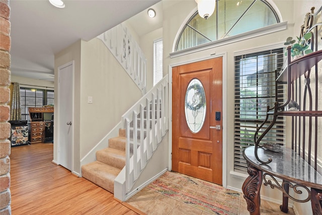 16310 Leamington Ln, Houston, TX 77095 - foyer with stairway, wood finished floors, and recessed lighting