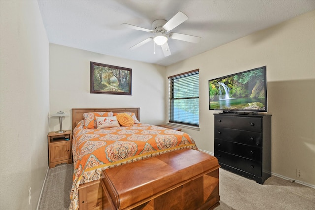 16310 Leamington Ln, Houston, TX 77095 - bedroom with light colored carpet, ceiling fan, and baseboards