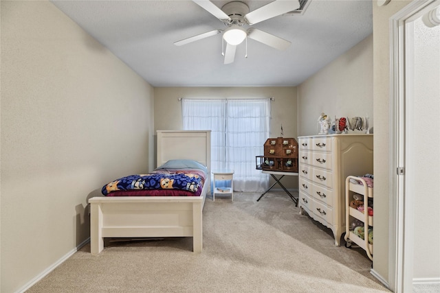 16310 Leamington Ln, Houston, TX 77095 - bedroom with light colored carpet and a ceiling fan