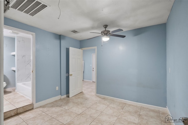 719 Kilpatrick St, Channelview, TX 77530 - spare room with a ceiling fan, tile patterned floors, and baseboards