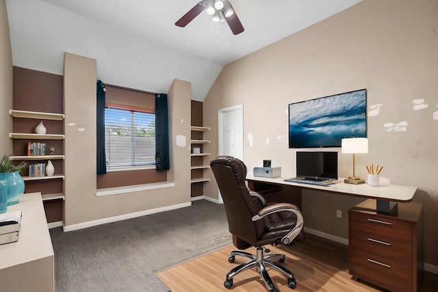25993 Royal Emerald Ln, Kingwood, TX 77339 - office area featuring a ceiling fan, baseboards, and lofted ceiling