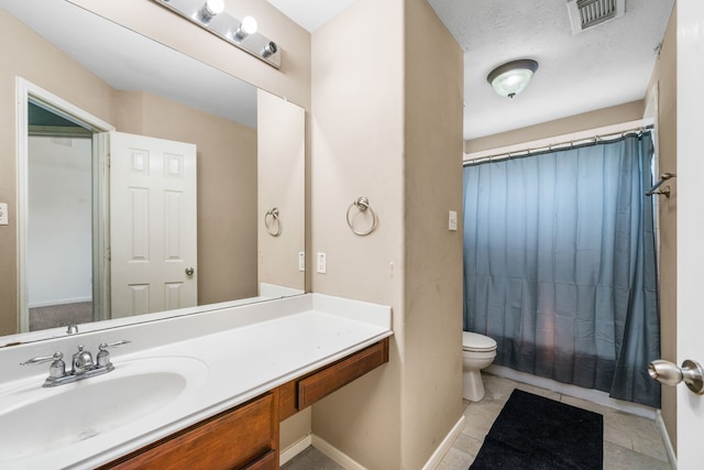 25993 Royal Emerald Ln, Kingwood, TX 77339 - bathroom with toilet, vanity, baseboards, shower / bath combo with shower curtain, and tile patterned flooring