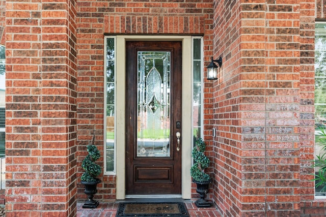 25993 Royal Emerald Ln, Kingwood, TX 77339 - property entrance featuring brick siding