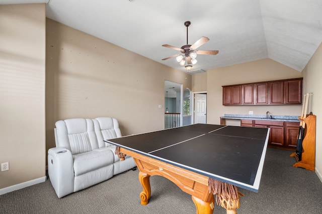 25993 Royal Emerald Ln, Kingwood, TX 77339 - playroom featuring ceiling fan, dark colored carpet, a sink, baseboards, and lofted ceiling