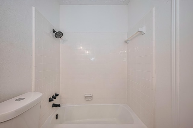 bathroom featuring toilet and shower / washtub combination