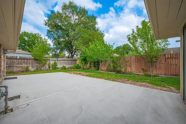 view of patio with a fenced backyard