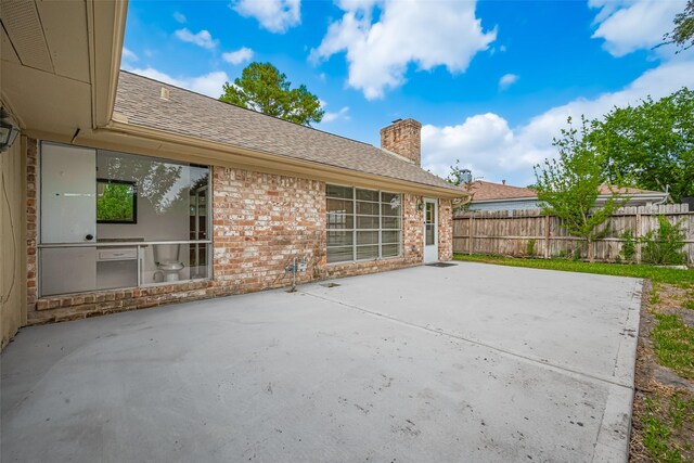 view of patio / terrace with fence