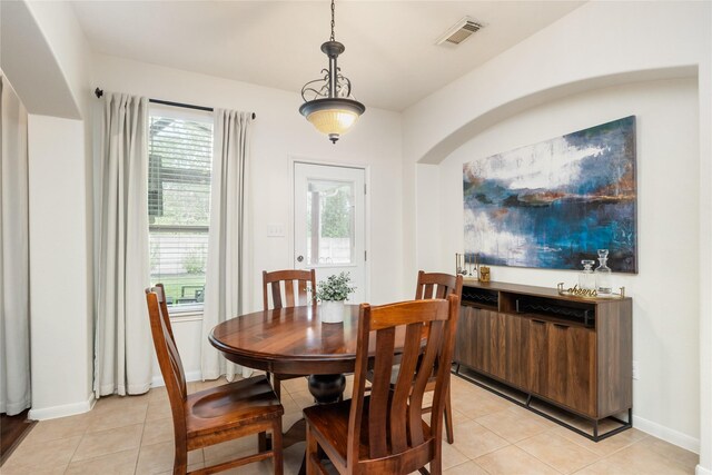 21247 Albany Park Ln, Spring, TX 77379 - dining area featuring light tile patterned floors and baseboards