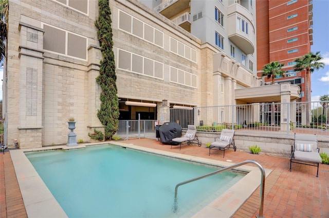 2520 Robinhood St Unit 1205, Houston, TX 77005 - community pool with a patio area