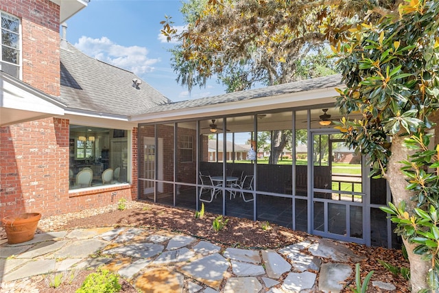 51 Oak Hollow Cir, Lake Jackson, TX 77566 - view of patio / terrace featuring a ceiling fan and a sunroom