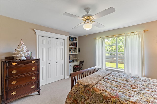 51 Oak Hollow Cir, Lake Jackson, TX 77566 - bedroom featuring light carpet, a closet, and a ceiling fan