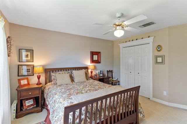 51 Oak Hollow Cir, Lake Jackson, TX 77566 - carpeted bedroom featuring a closet, baseboards, and ceiling fan