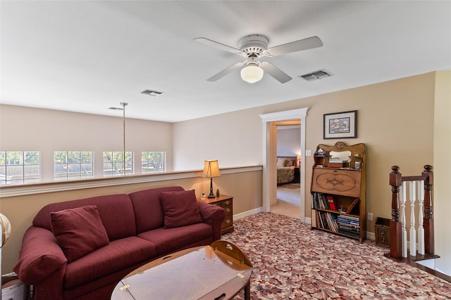 51 Oak Hollow Cir, Lake Jackson, TX 77566 - living room featuring ceiling fan, carpet floors, and baseboards