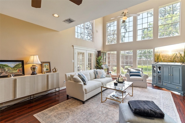 51 Oak Hollow Cir, Lake Jackson, TX 77566 - living room featuring ceiling fan, dark wood-type flooring, a high ceiling, and recessed lighting