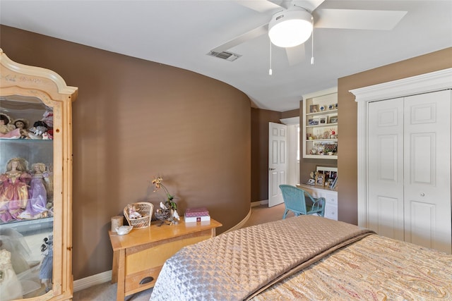 51 Oak Hollow Cir, Lake Jackson, TX 77566 - bedroom with light carpet, a closet, baseboards, and ceiling fan