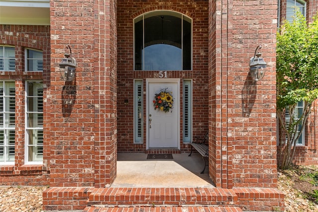 51 Oak Hollow Cir, Lake Jackson, TX 77566 - view of exterior entry with brick siding