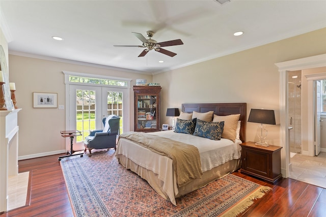 51 Oak Hollow Cir, Lake Jackson, TX 77566 - bedroom with wood finished floors, multiple windows, baseboards, crown molding, and recessed lighting
