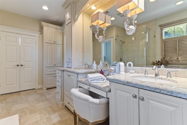 51 Oak Hollow Cir, Lake Jackson, TX 77566 - bathroom with a shower stall, vanity, and recessed lighting