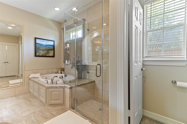 51 Oak Hollow Cir, Lake Jackson, TX 77566 - full bathroom featuring a garden tub and a stall shower