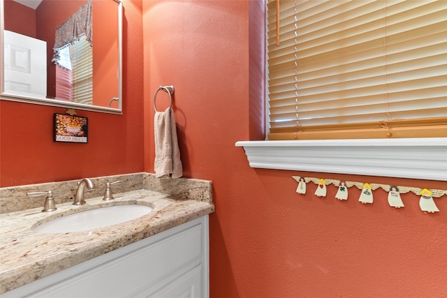 51 Oak Hollow Cir, Lake Jackson, TX 77566 - bathroom featuring vanity and a textured wall
