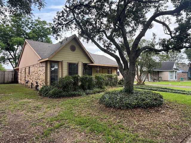 405 Tudor Ct, Deer Park, TX 77536 - ranch-style house with brick siding and a shingled roof