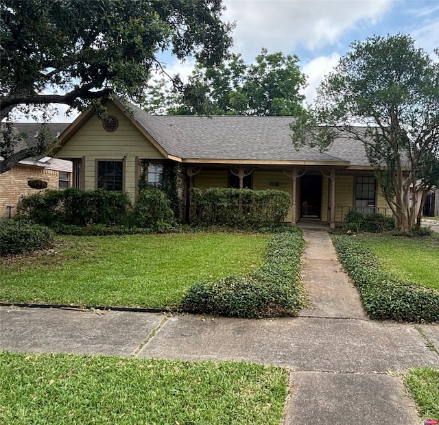 405 Tudor Ct, Deer Park, TX 77536 - single story home featuring a front lawn and a shingled roof