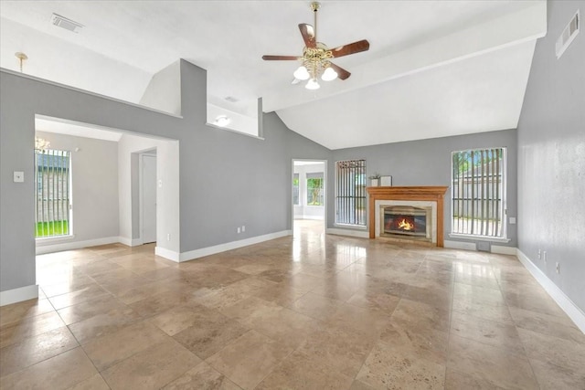 11710 Brettwood Cir, Houston, TX 77089 - unfurnished living room with a ceiling fan, baseboards, a glass covered fireplace, and high vaulted ceiling