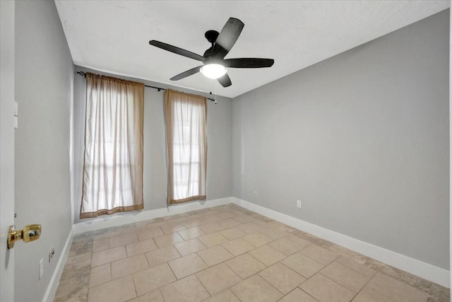 11710 Brettwood Cir, Houston, TX 77089 - empty room featuring baseboards, ceiling fan, and light tile patterned floors