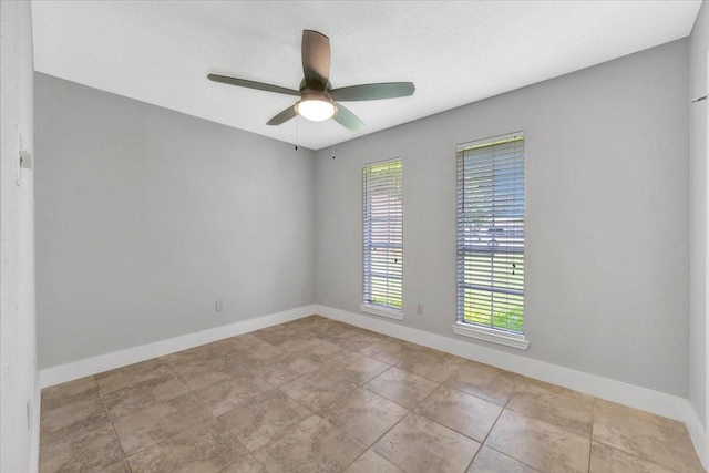 11710 Brettwood Cir, Houston, TX 77089 - empty room with a ceiling fan and baseboards
