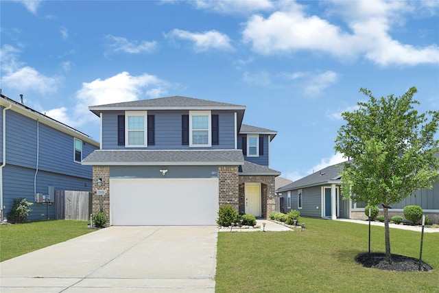 21626 Sage Landing Ln, Katy, TX 77449 - view of front of home featuring driveway, brick siding, a garage, and roof with shingles