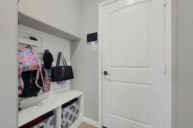 21626 Sage Landing Ln, Katy, TX 77449 - mudroom featuring wood finished floors and baseboards