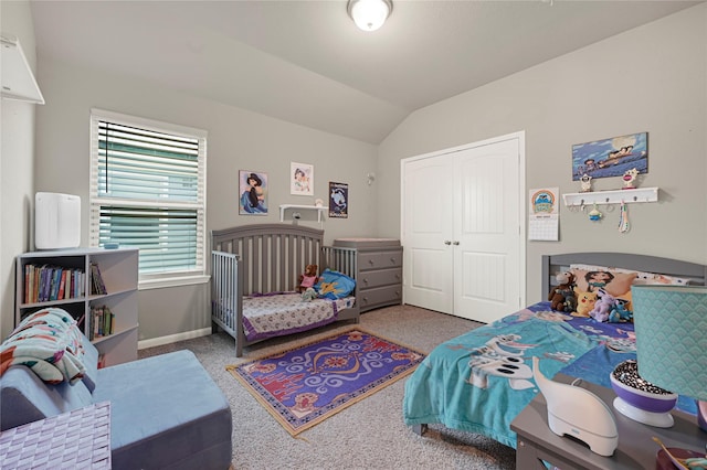21626 Sage Landing Ln, Katy, TX 77449 - carpeted bedroom with vaulted ceiling, a closet, and baseboards