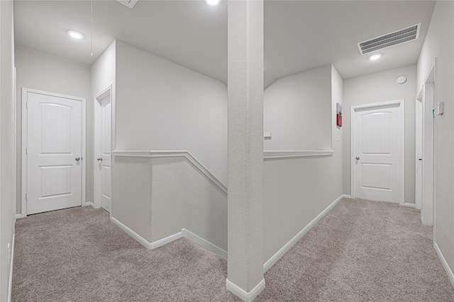 21626 Sage Landing Ln, Katy, TX 77449 - hallway featuring carpet floors, an upstairs landing, baseboards, and recessed lighting