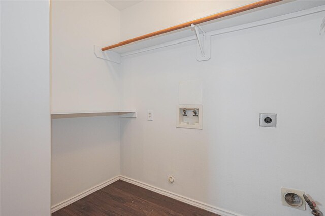 8223 Golf Green Cir, Houston, TX 77036 - clothes washing area with hookup for an electric dryer, hookup for a washing machine, dark wood finished floors, hookup for a gas dryer, and baseboards