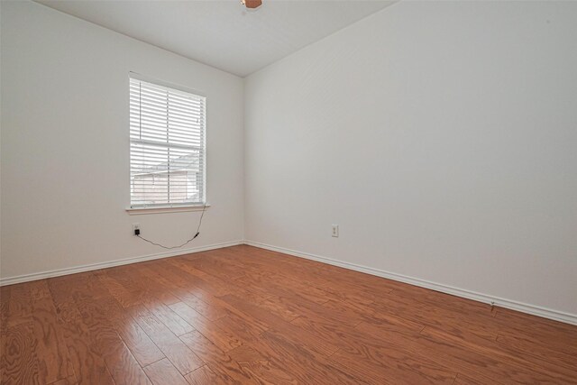 8223 Golf Green Cir, Houston, TX 77036 - unfurnished room with wood finished floors and baseboards
